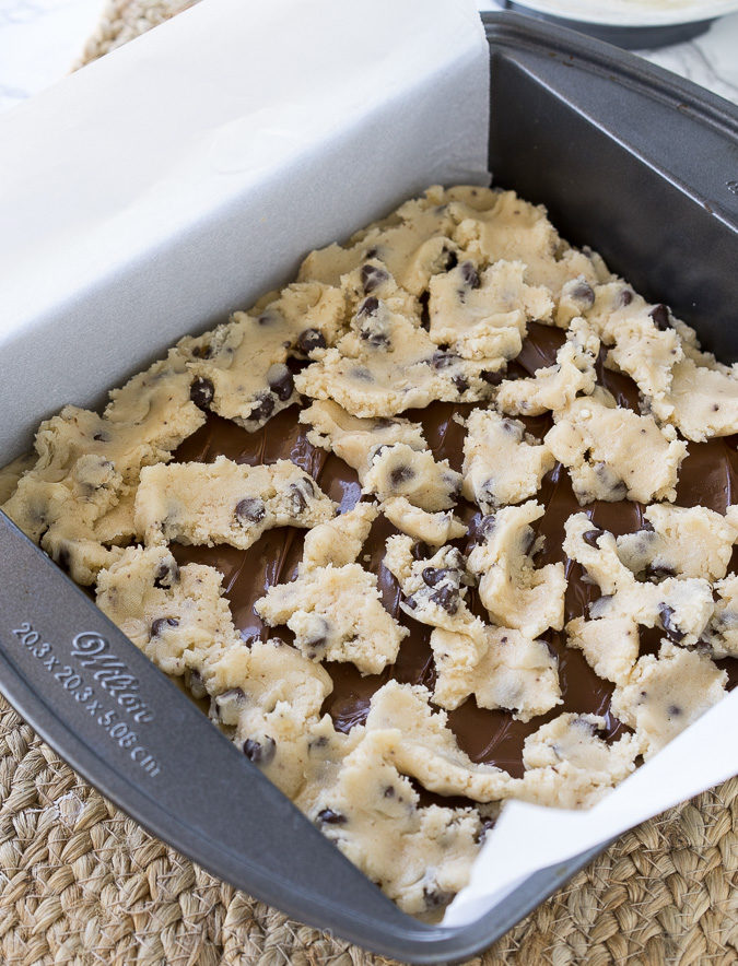 These Chocolate Chip Crumb Bars have a gooey chocolate hazelnut center and are made with just 4 simple ingredients, including muffin mix! So easy!