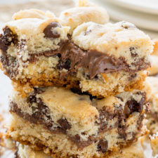 These Chocolate Chip Crumb Bars have a gooey chocolate hazelnut center and are made with just 4 simple ingredients, including muffin mix! So easy!