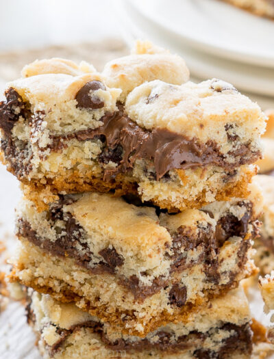 These Chocolate Chip Crumb Bars have a gooey chocolate hazelnut center and are made with just 4 simple ingredients, including muffin mix! So easy!