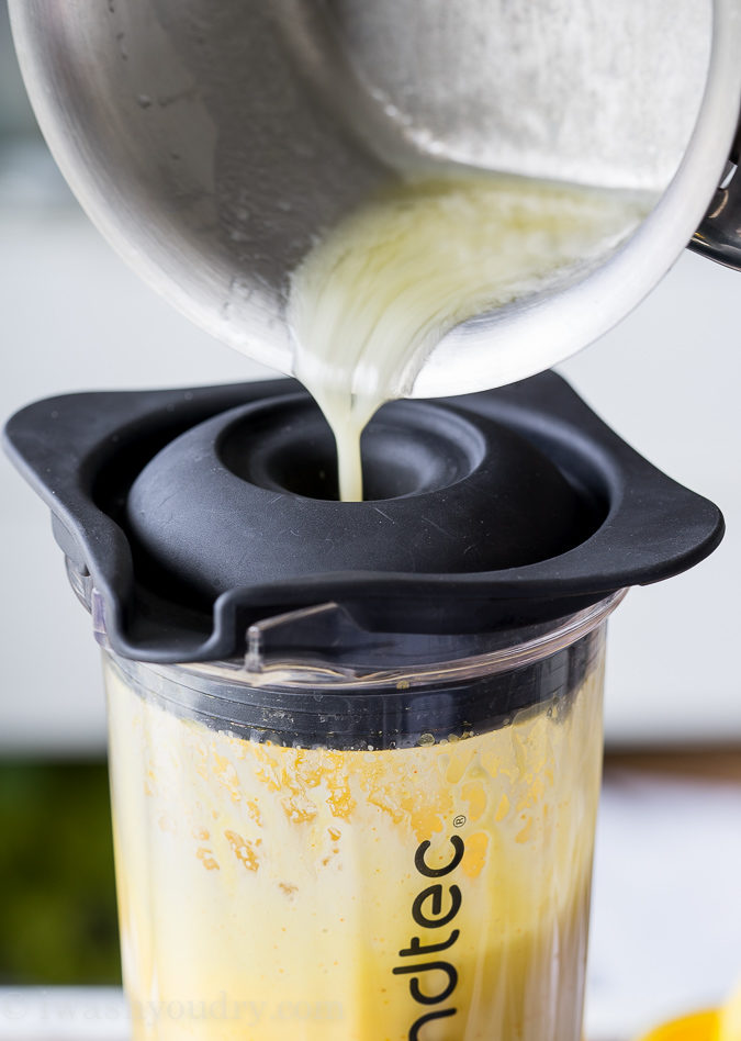 pouring melted butter in blender