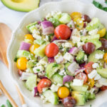 This Cucumber Tomato Avocado Salad is so fresh and delicious! I love the super simple dressing that it's tossed in!