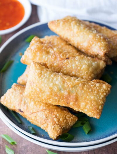 This Crispy Chicken Egg Rolls Recipe is just as good as takeout for a fraction of the cost and super easy to make too!