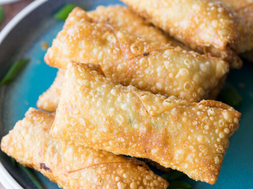 This Crispy Chicken Egg Rolls Recipe is just as good as takeout for a fraction of the cost and super easy to make too!