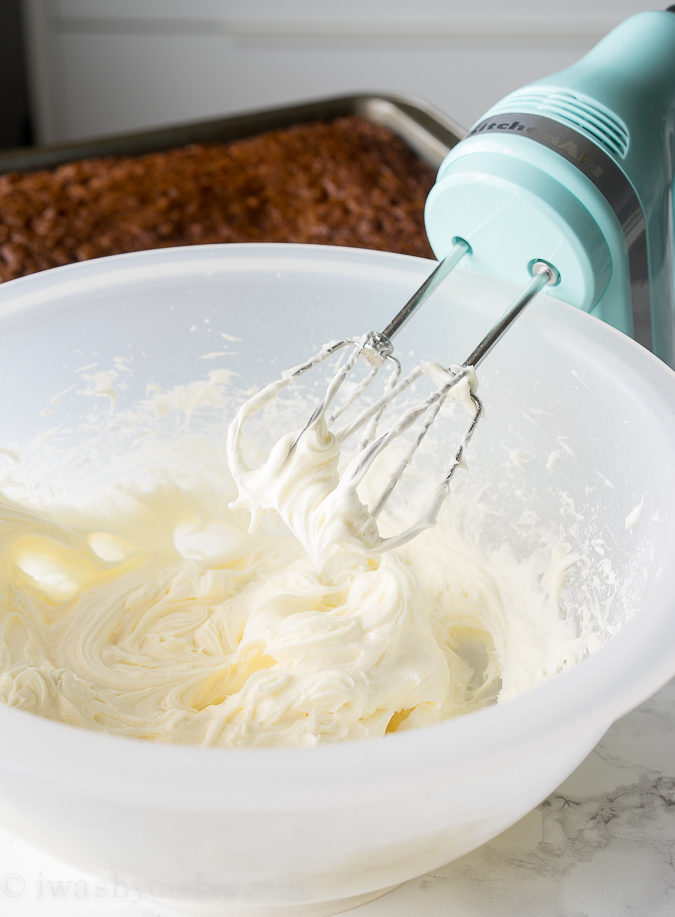 Classic Homemade Carrot Cake Recipe! Filled with shredded carrots and just the right amount of sweetness, plus a killer homemade cream cheese frosting recipe too!