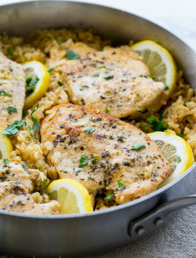 This Lemon Chicken Rice Skillet is all made in ONE PAN and is a super easy and delicious weeknight dinner recipe!