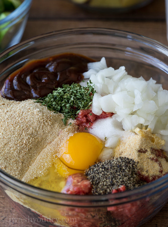 Combine all the ingredients for your meatloaf in one bowl and mix with your hands! This is the BEST meatloaf recipe out there!