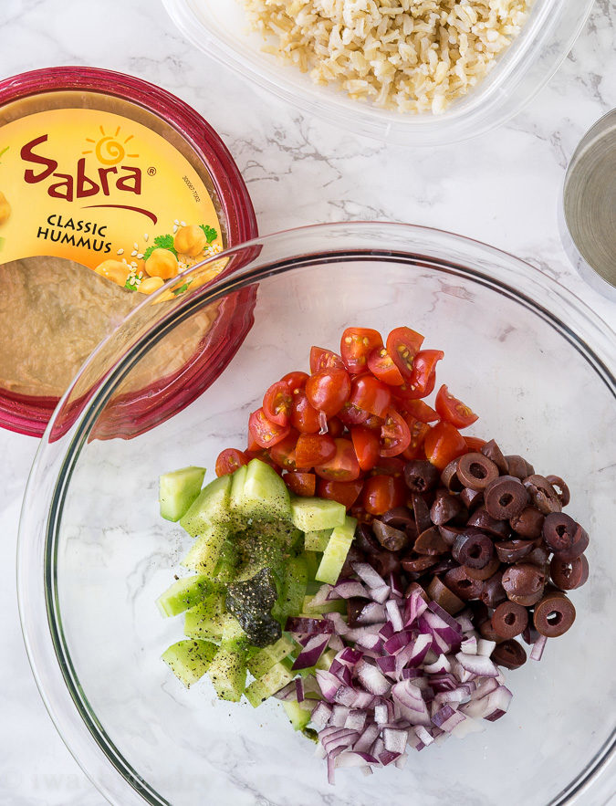 All you need to whip up some gorgeous Mediterranean Hummus Stacks are cucumbers, onion, tomato, kalmata olives and of course, some @Sabra hummus!