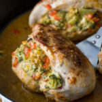 My husband and kids LOVED this super easy dinner recipe! Broccoli Cheese Stuffed Chicken Breast is going in my normal menu rotation!