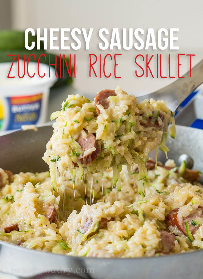 This Cheesy Sausage Zucchini Rice Skillet is a super quick dinner that's filled with everything my family loves, plus I get to sneak in some veggies!