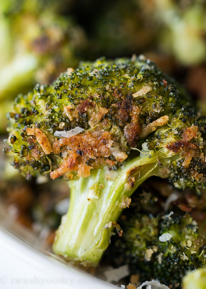 This Parmesan Roasted Broccoli is my new favorite way to eat broccoli! It's so simple and seriously so addictive! It's definitely a delicious baked broccoli recipe!