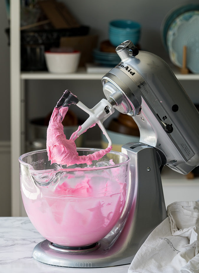 This pink fluffy sugar cookie icing is perfectly sweet and delicious!