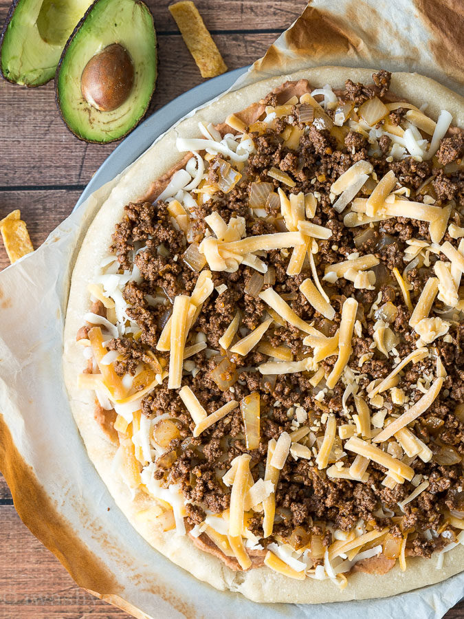 This Taco Pizza recipe is perfect for pizza night and taco Tuesday combined! 