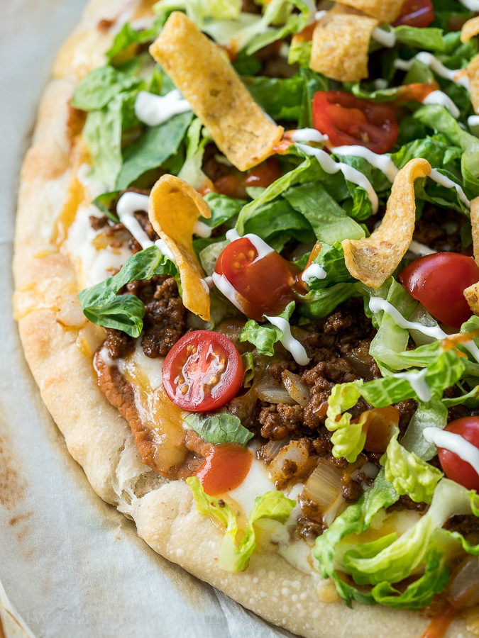 You're going to LOVE this Super Easy Taco Pizza! It's the best of both worlds!