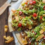 You're going to LOVE this Super Easy Taco Pizza! It's the best of both worlds!