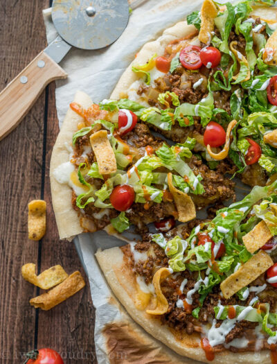 You're going to LOVE this Super Easy Taco Pizza! It's the best of both worlds!