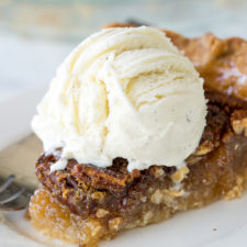 This Classic Pecan Pie Recipe is so easy to make! Just mix everything in a bowl and pour into a pie crust!