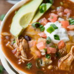 This Instant Pot Chicken Taco Soup recipe is seriously so easy to make! My kids devoured this!