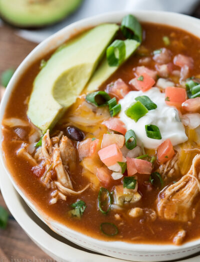 This Instant Pot Chicken Taco Soup recipe is seriously so easy to make! My kids devoured this!