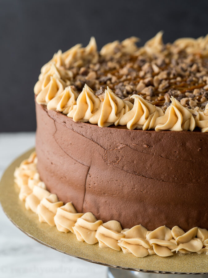 This decadent Chocolate Dulce de Leche Cake is filled with caramel and topped with toffee bits!