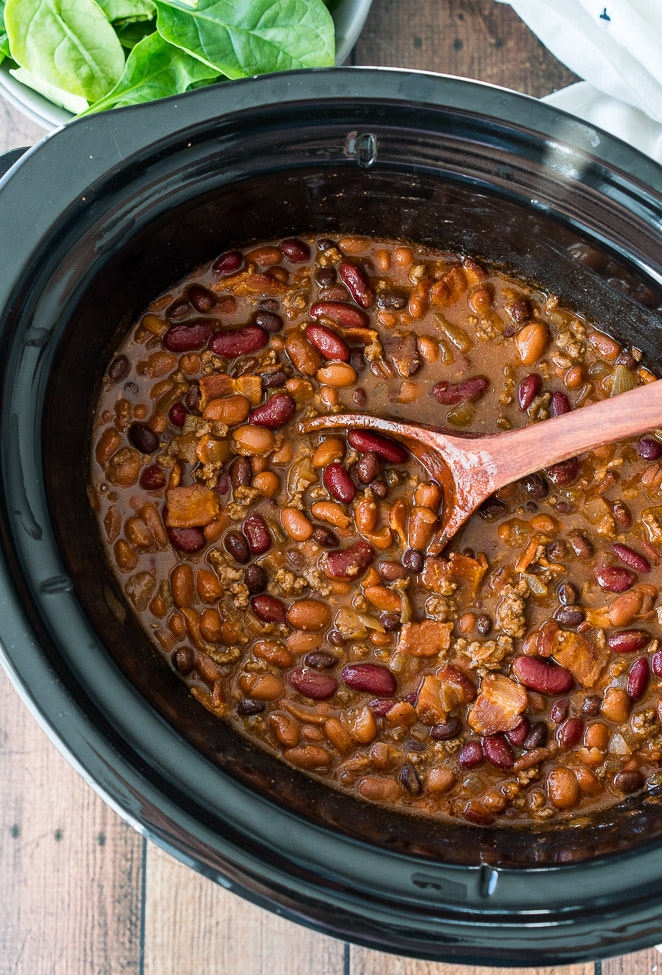 These Slow Cooker Steakhouse Cowboy Beans are a thick and hearty side dish with a punch of savory and sweet spices!