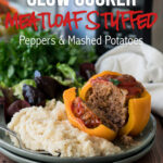 WINNER! My family LOVED this Slow Cooker Meatloaf Stuffed Peppers with Mashed Potatoes! So easy and a complete dinner in one pot!