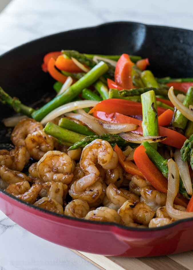 This quick and easy Honey Garlic Shrimp Stir Fry is filled with plump shrimp and fresh veggies in a simple and delicious honey garlic sauce!