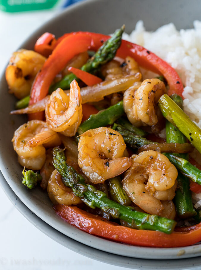 This quick and easy Honey Garlic Shrimp Stir Fry is filled with plump shrimp and fresh veggies in a simple and delicious honey garlic sauce!