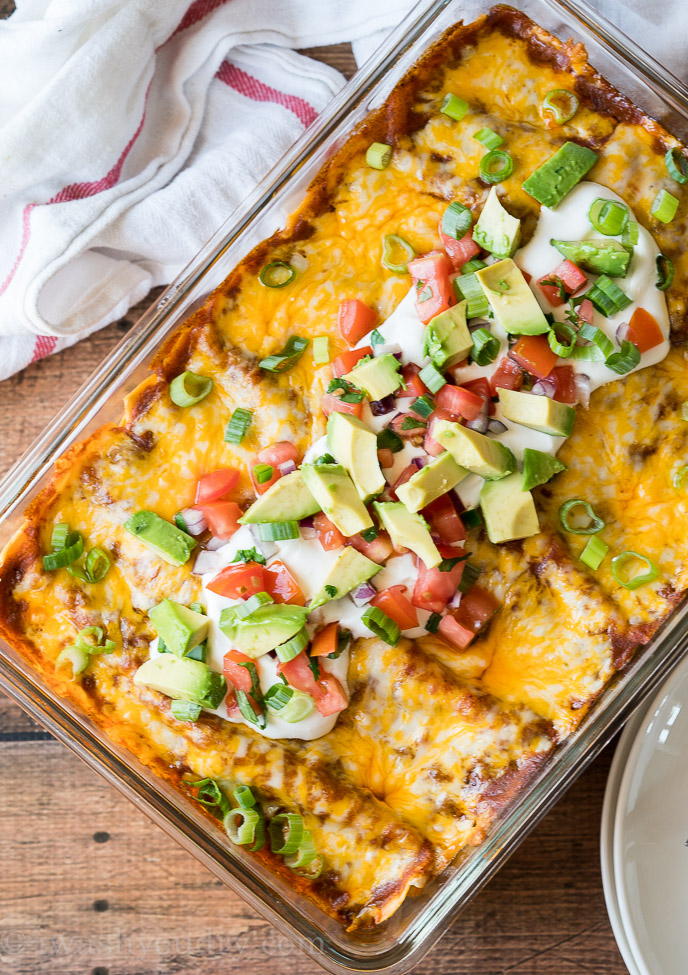 Once your beef enchiladas are done, top with all your favorite taco toppings and enjoy!