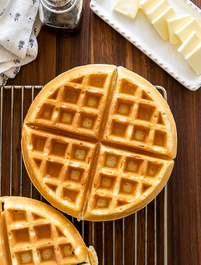 Classic Waffles cooling on a wire baking rack.