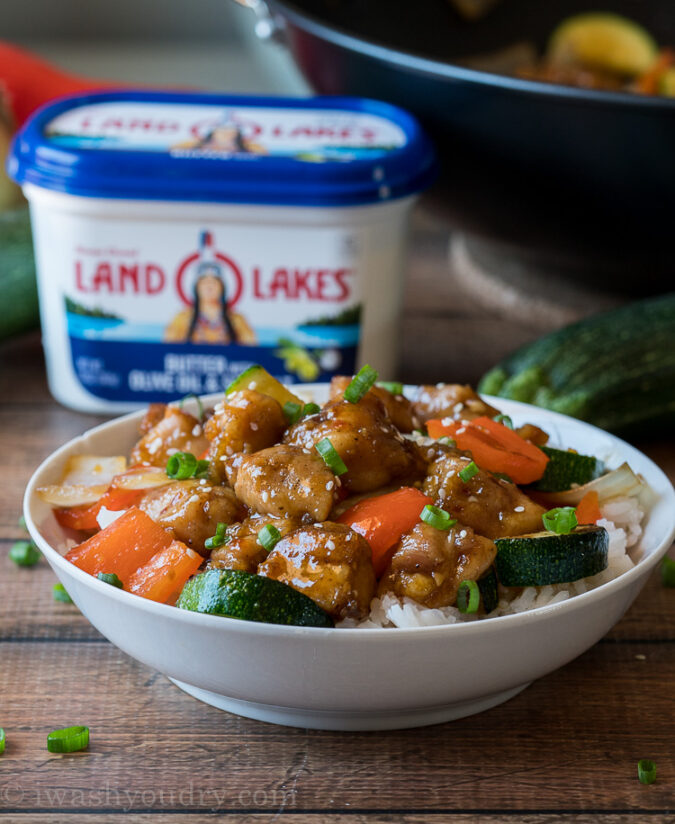 This super easy Honey Garlic Chicken Recipe is a quick and easy weeknight dinner that's filled with zucchini, bell peppers and chicken!