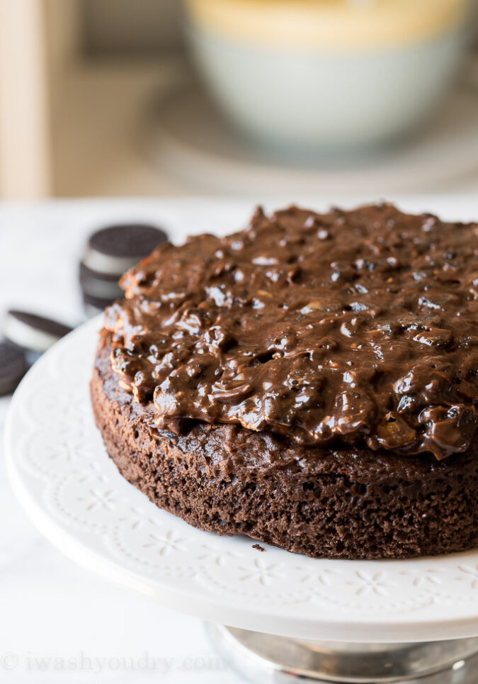 Spread the hot fudge cookie mixture on top of your prepared cake layer.