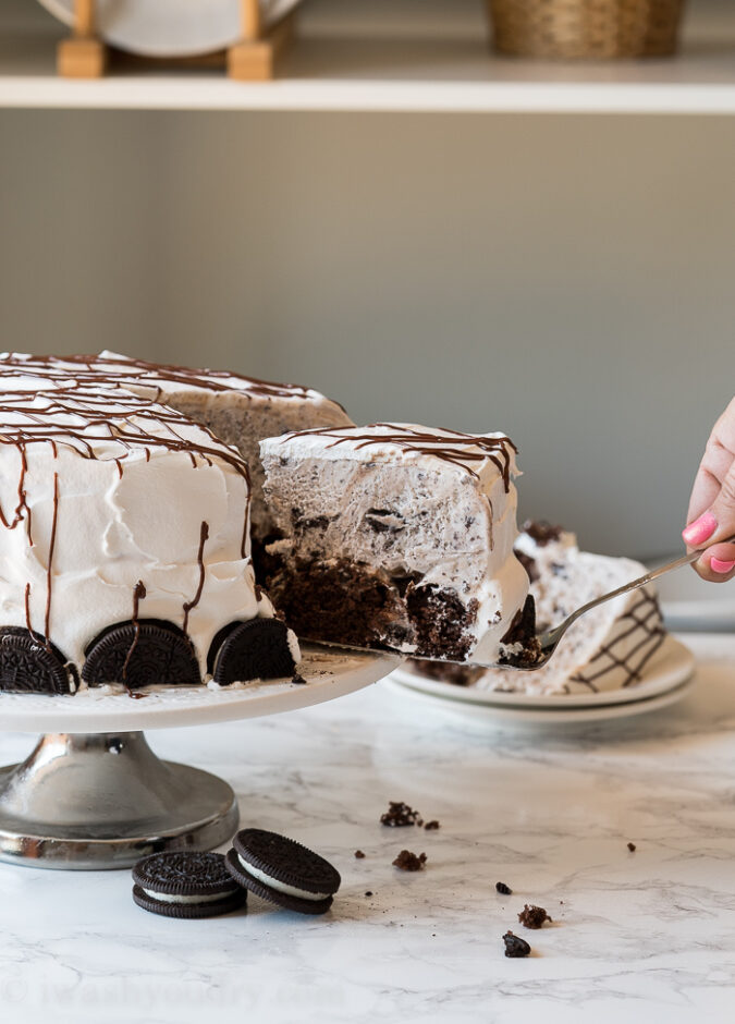 Decorate the outside of your homemade ice cream cake with extra oreo cookies and drizzles of hot fudge.