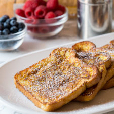 A close up of a plate of food, with Toast