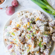 A plate of food, with potato salad