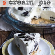 A slice of banana Oreo Cream Pie on a plate next to a full pie with a slice removed