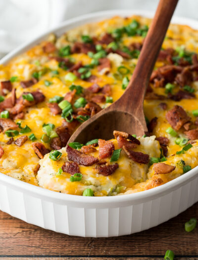 Top the mashed potato casserole with more cheese, crumbled bacon and green onions before baking again. Everyone will love this super easy side dish recipe!