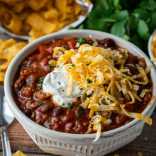 This crockpot chili recipe is thick and hearty and perfect for an easy weeknight dinner recipe!