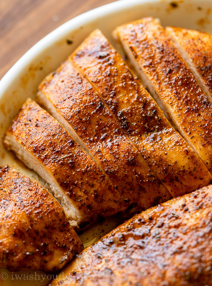 Sliced chicken breast in a rimmed dish.