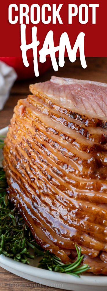 YUM! This super easy Slow Cooker Ham Recipe is glazed with brown sugar, honey and apple cider! So perfect for Easter Dinner!