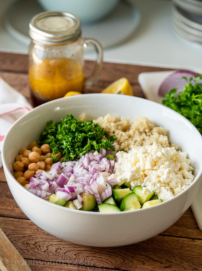 Combine all the ingredients for this cool and refreshing quinoa salad in a large bowl. 