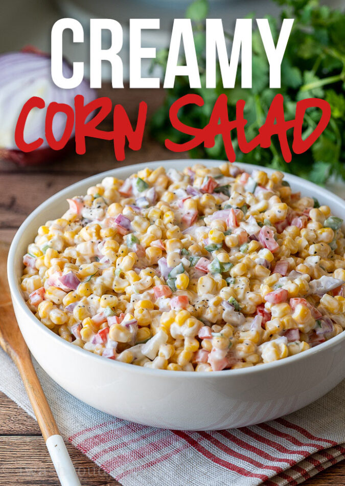 This Creamy Corn Salad Recipe is a quick and easy side dish that's filled with crisp corn kernels that pop in a creamy sauce; perfect for summer potlucks and bbq's!