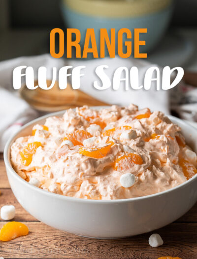 This cool and creamy Orange Fluff Salad Recipe is made with jello, whipped topping, mandarin oranges and a surprise ingredient that you wouldn't expect!