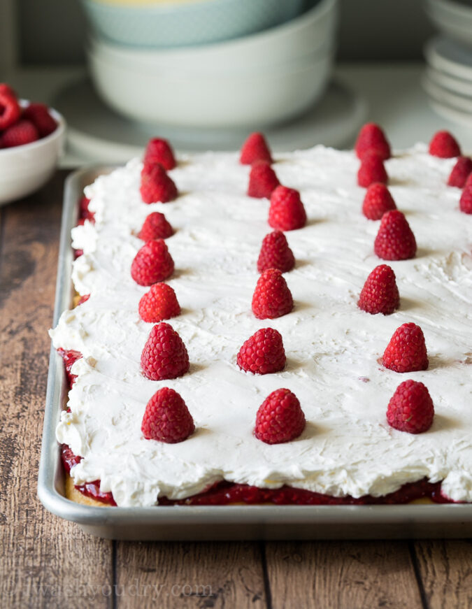 Top this Vanilla Raspberry Sheet Cake with fresh raspberries for a pretty presentation!