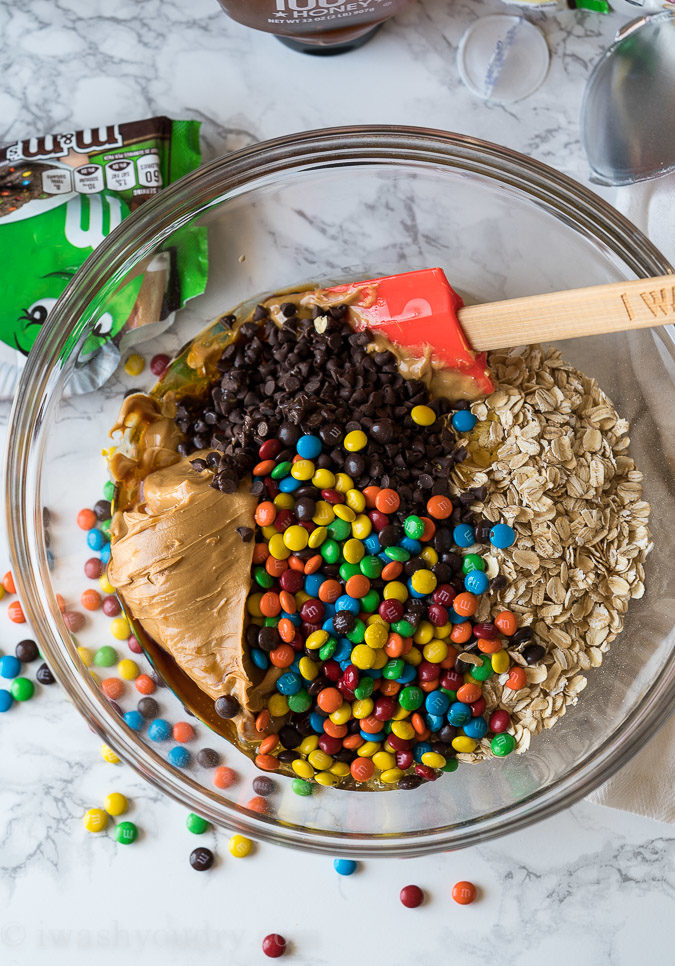 Combine the No bake Oatmeal Cookie Balls ingredients into a large bowl and use a sturdy spoon to combine.