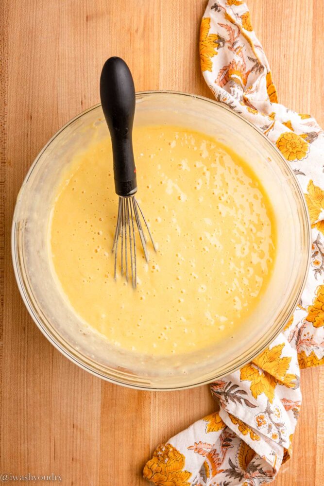 cake batter in bowl with whisk