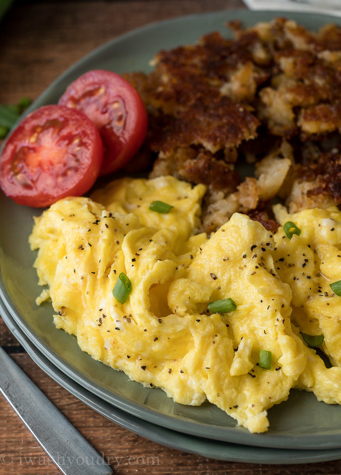 This super easy Fluffy Scrambled Eggs Recipe is more of a technique rather than recipe, resulting in creamy, fluffy eggs every time!