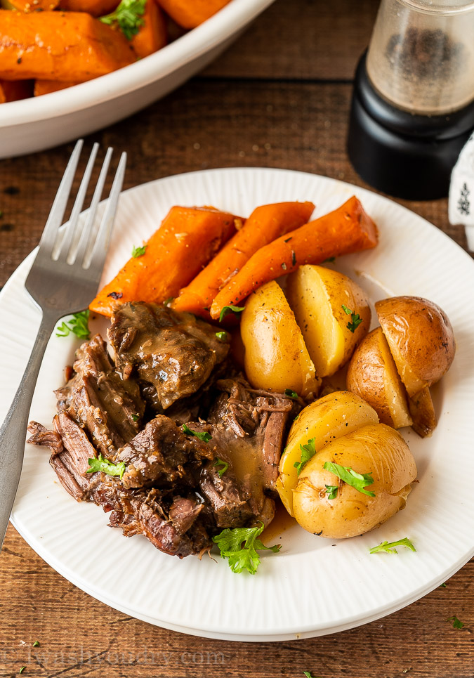 Plated Pot Roast with carrots and potatoes.