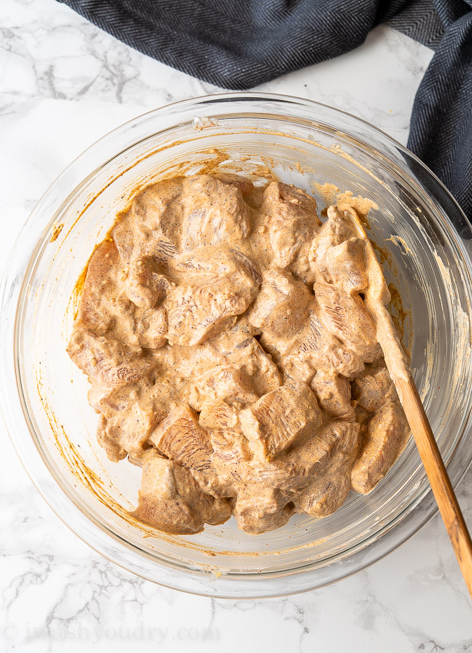 Marinate the butter chicken in sour cream and spices before cooking