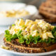 A close up of a plate of food, with Egg and Salad