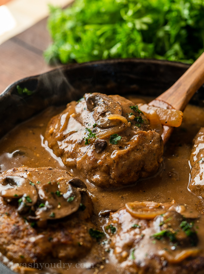 All you need is 30 minutes to whip up this super easy Salisbury Steak Recipe. Filled with seasoned ground beef "steaks" and simmered in a rich mushroom gravy, this dish is best served over creamy mashed potatoes!